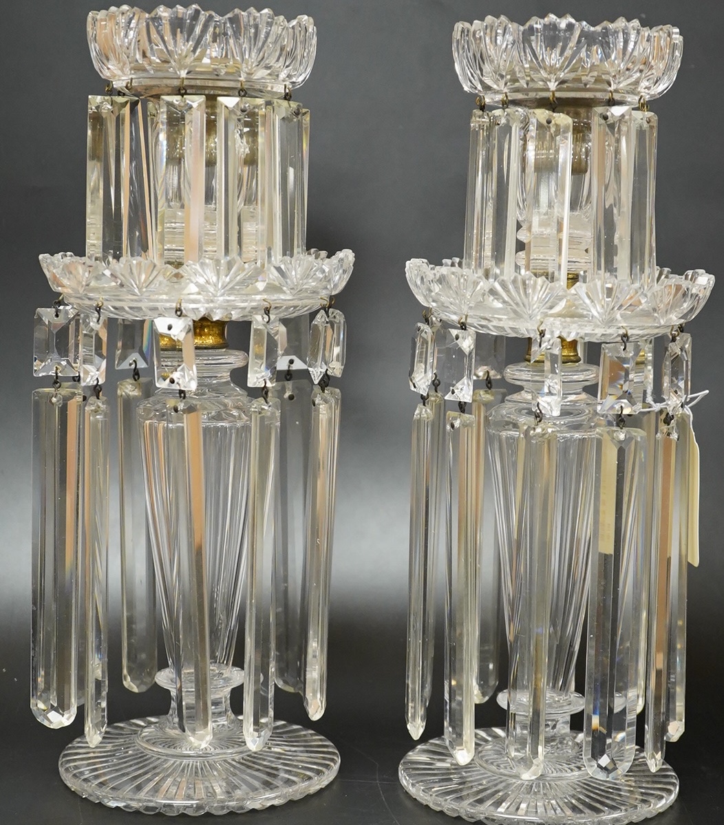 A pair of George IV cut glass lustres, 30cm high